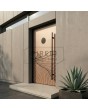 Porte d'entrée en aluminium avec texture cuivrée en métal fraisé